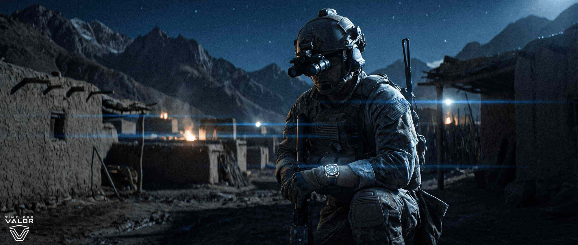 Soldier in tactical gear with a rifle at night in a mountainous desert landscape.